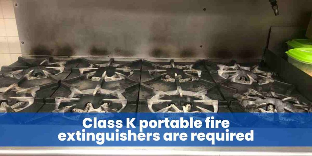 Class K portable fire extinguishers are required